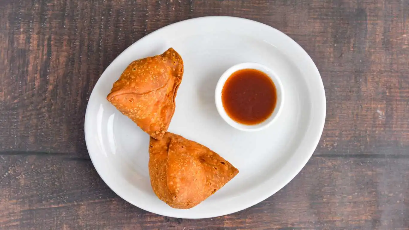 Samosa — crispy stuffed pastry at Singh Sweet Mahal, Winnipeg